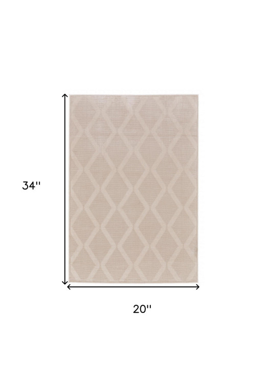 2' x 3' Ivory and Tan Geometric Stain Resistant Area Rug