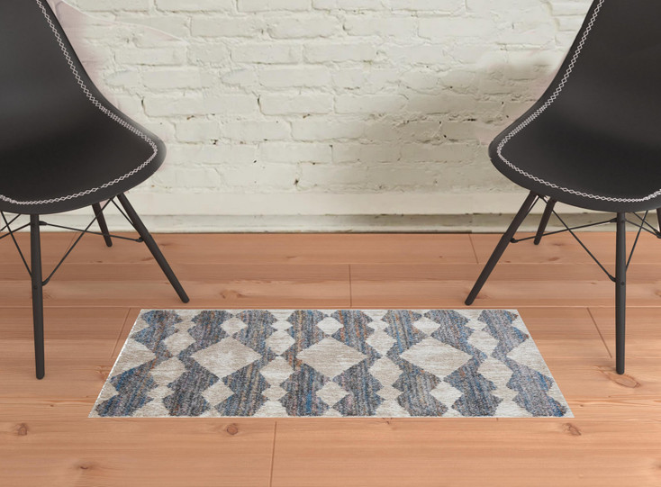 2' x 3' Tan Ivory and Blue Chevron Power Loom Stain Resistant Area Rug
