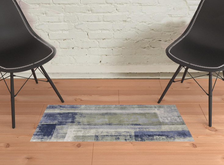 2' x 3' Blue Green and Ivory Abstract Power Loom Distressed Area Rug