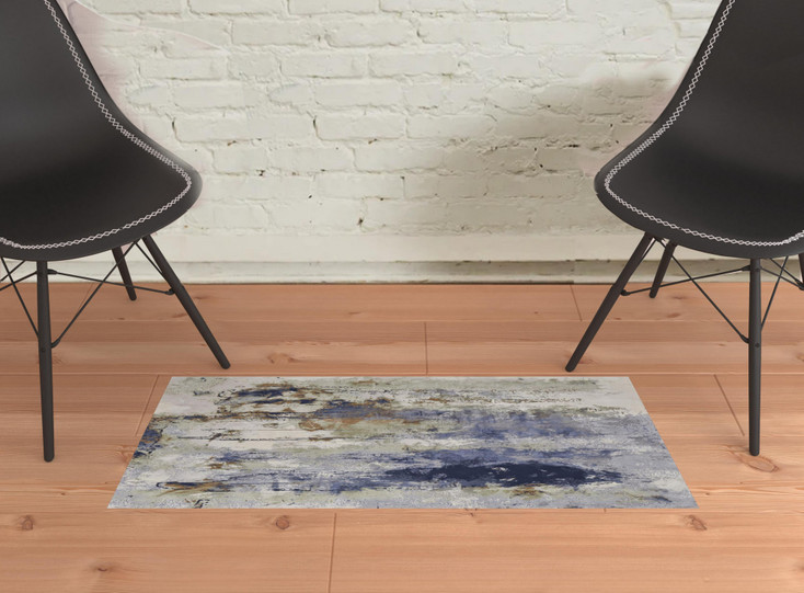 2' x 3' Blue Orange and Ivory Abstract Power Loom Area Rug