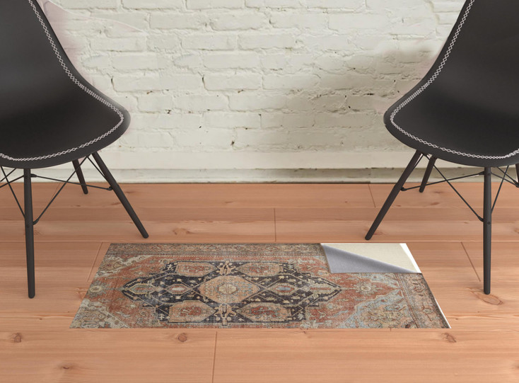 2' x 3' Orange Brown and Taupe Abstract Area Rug