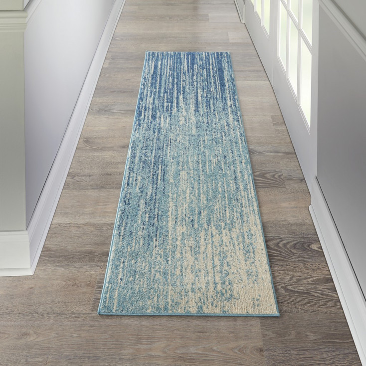 2' x 6' Ivory and Blue Abstract Power Loom Polypropylene Runner Rug