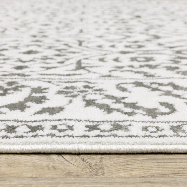 2' x 8' Grey and White Floral Power Loom Stain Resistant Runner Rug