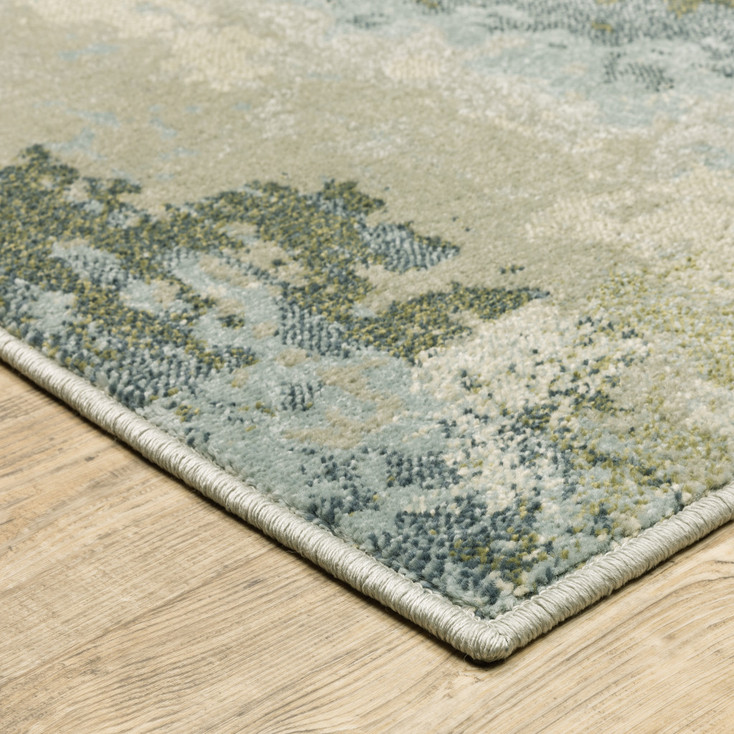 3' x 5' Blue Green Grey and Ivory Abstract Power Loom Stain Resistant Area Rug