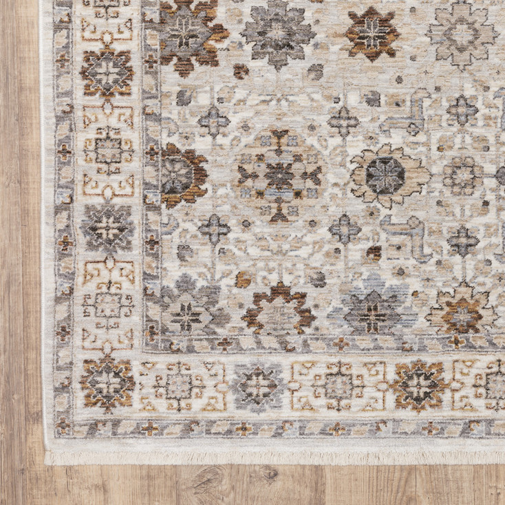 3' x 5' Ivory and Gold Oriental Power Loom Stain Resistant Area Rug with Fringe