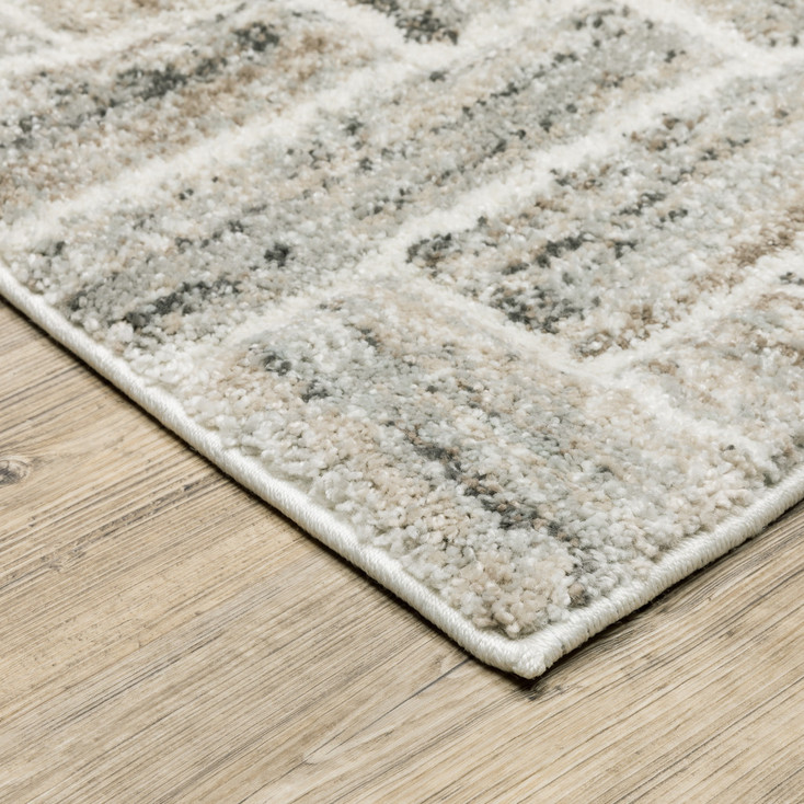 3' x 5' Ivory Beige Grey Brown Pale Blue and Charcoal Geometric Power Loom Area Rug