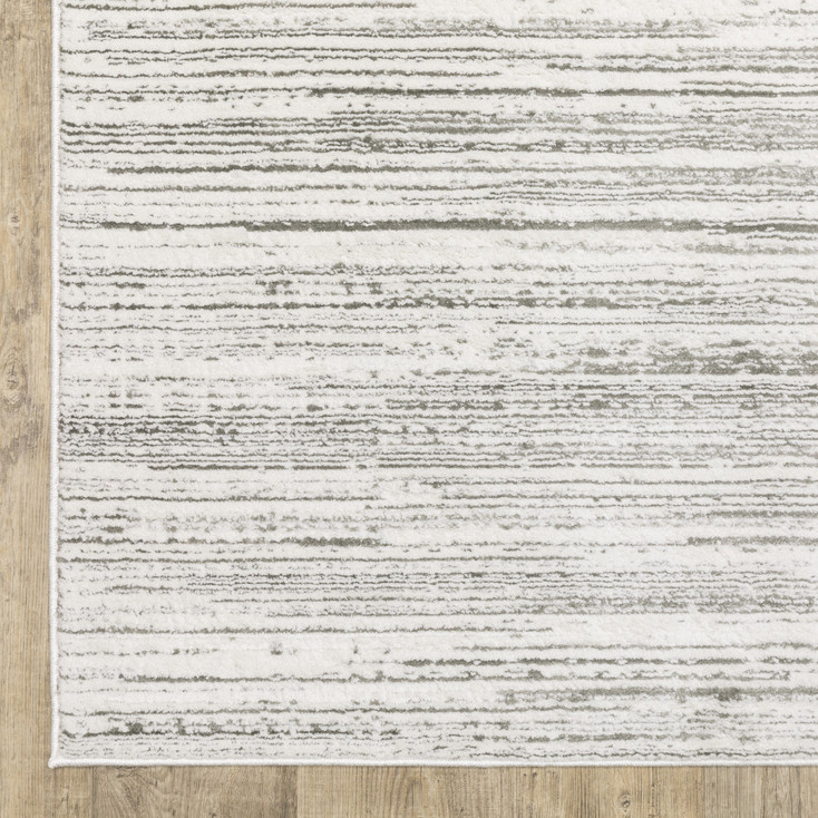 3' x 5' White and Grey Abstract Power Loom Stain Resistant Area Rug