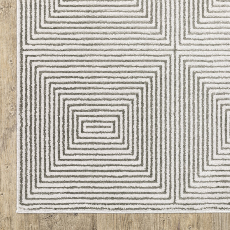 3' x 5' Grey and White Geometric Power Loom Stain Resistant Area Rug