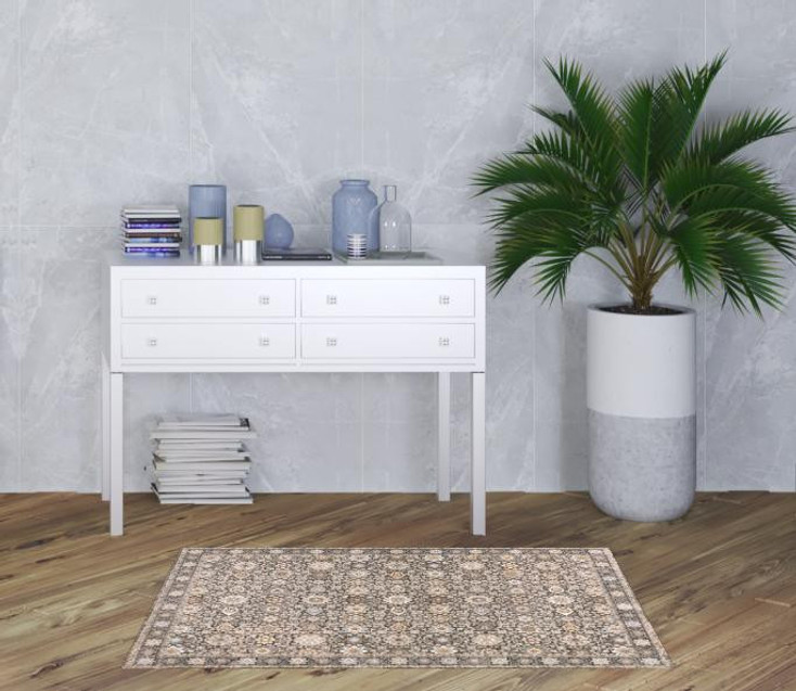 3' x 5' Grey and Ivory Oriental Power Loom Stain Resistant Area Rug with Fringe