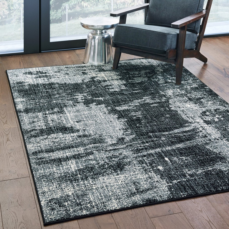 4' x 5' Black Ivory Machine Woven Abstract Indoor Area Rug
