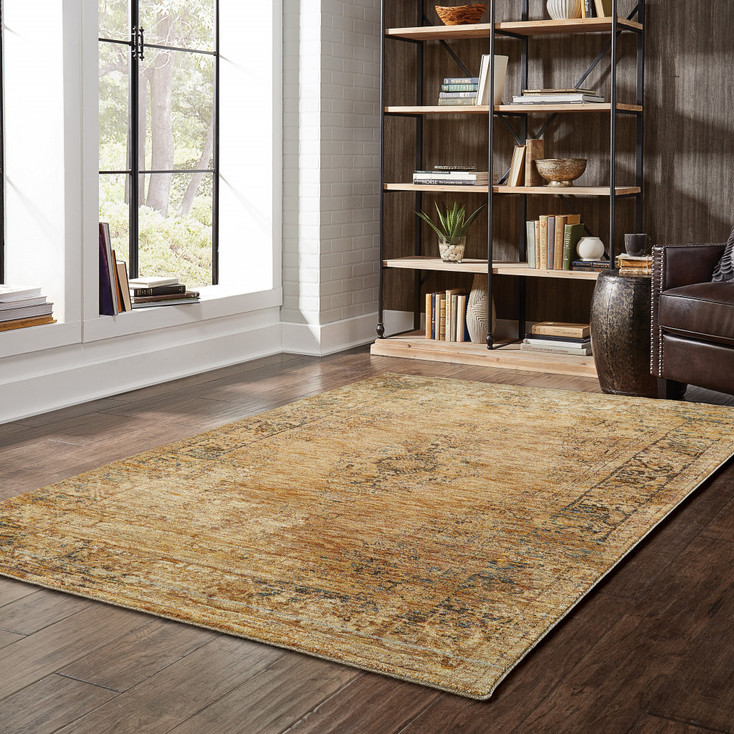 4' x 5' Gold and Brown Oriental Power Loom Stain Resistant Area Rug
