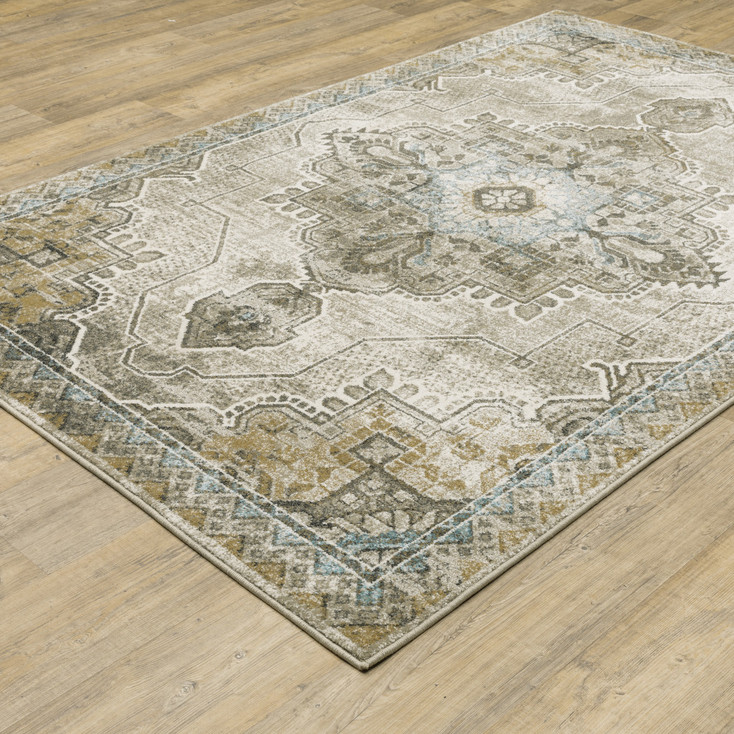 4' x 6' Grey Blue Beige and Gold Oriental Power Loom Stain Resistant Area Rug