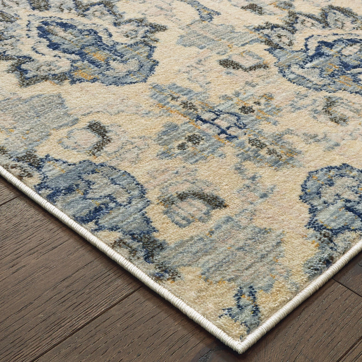 4' x 6' Ivory and Blue Floral Power Loom Stain Resistant Area Rug