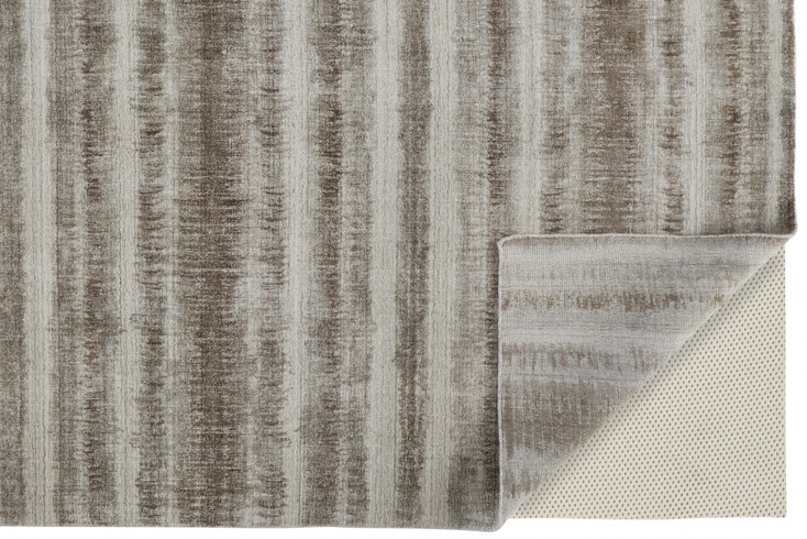 4' x 6' Tan Ivory and Brown Abstract Hand Woven Area Rug