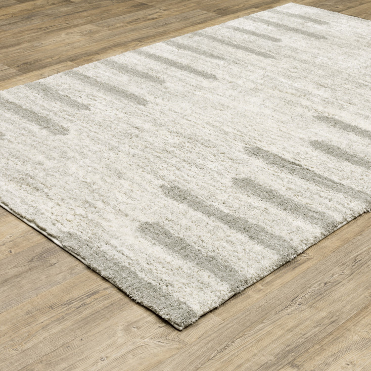 4' x 6' Ivory and Grey Geometric Shag Power Loom Stain Resistant Area Rug