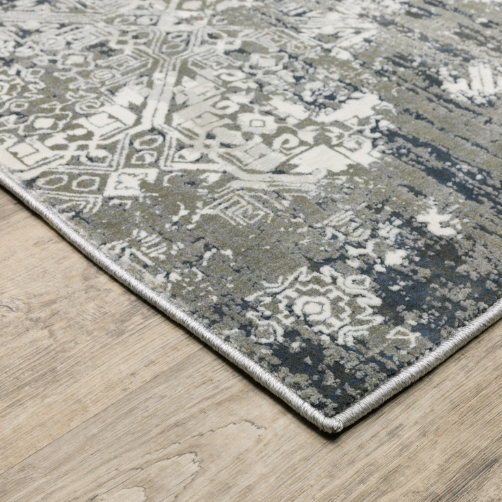 4' x 6' Ivory Grey Blue and Taupe Abstract Power Loom Stain Resistant Area Rug