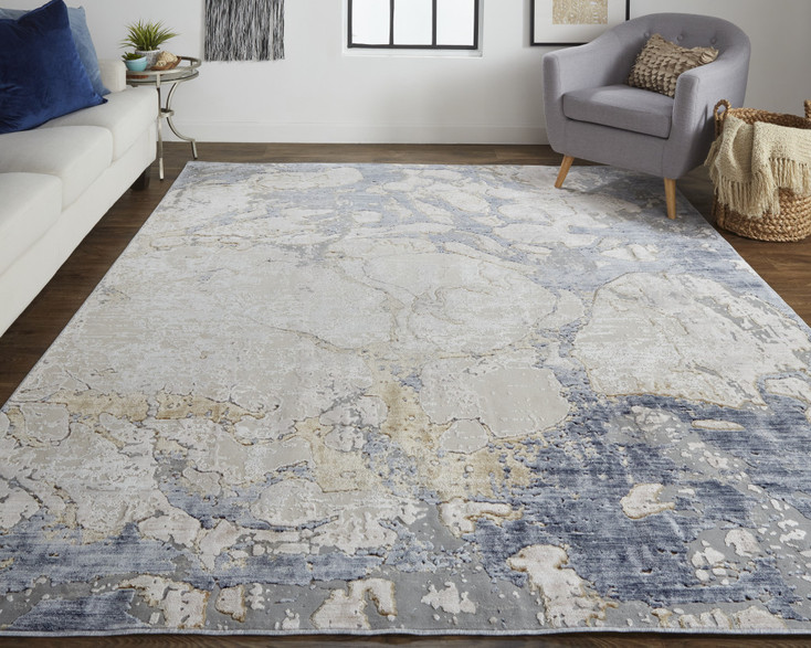 4' x 6' Tan and Blue Abstract Power Loom Distressed Area Rug