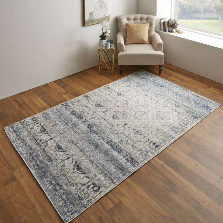 4' x 6' Blue and Ivory Power Loom Distressed Area Rug