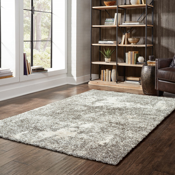 4' x 6' Gray and Ivory Distressed Abstract Area Rug