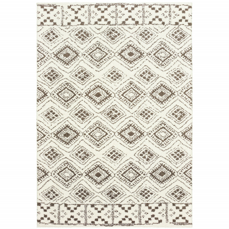 4' x 6' Ivory and Brown Geometric Shag Power Loom Stain Resistant Area Rug