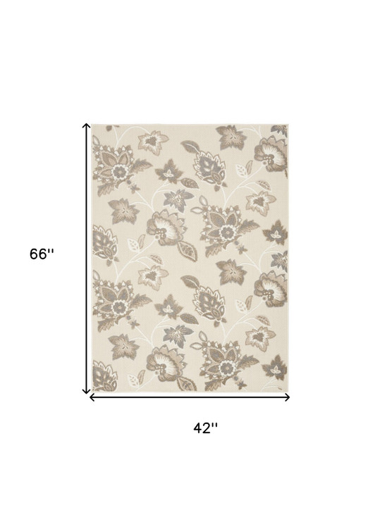 4' x 6' Beige Floral Stain Resistant Non Skid Polypropylene Area Rug