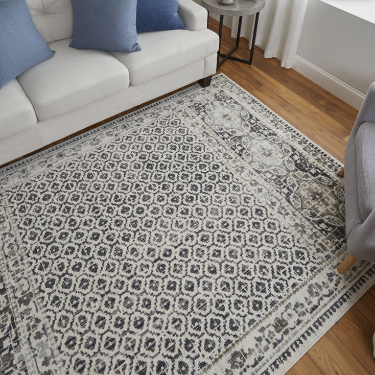 4' x 6' Ivory Taupe and Gray Abstract Stain Resistant Area Rug