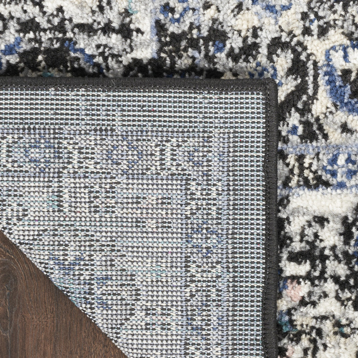 5' x 7' Black Floral Power Loom Distressed Area Rug