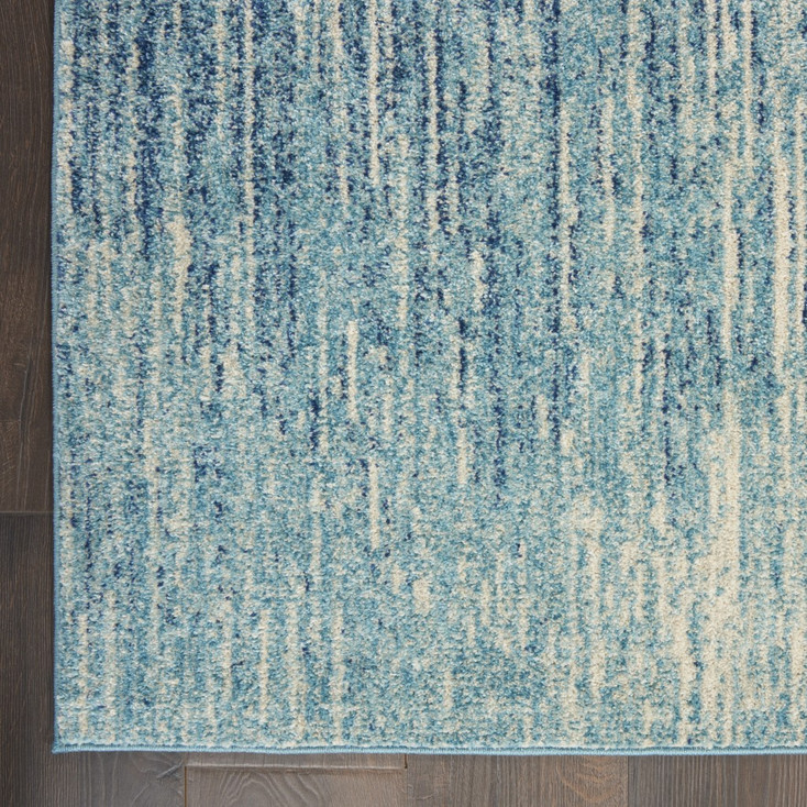 5' x 7' Ivory & Blue Abstract Power Loom Area Rug