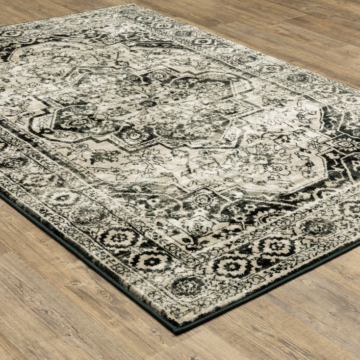 5' x 7' Black Grey Tan and Ivory Oriental Power Loom Stain Resistant Area Rug