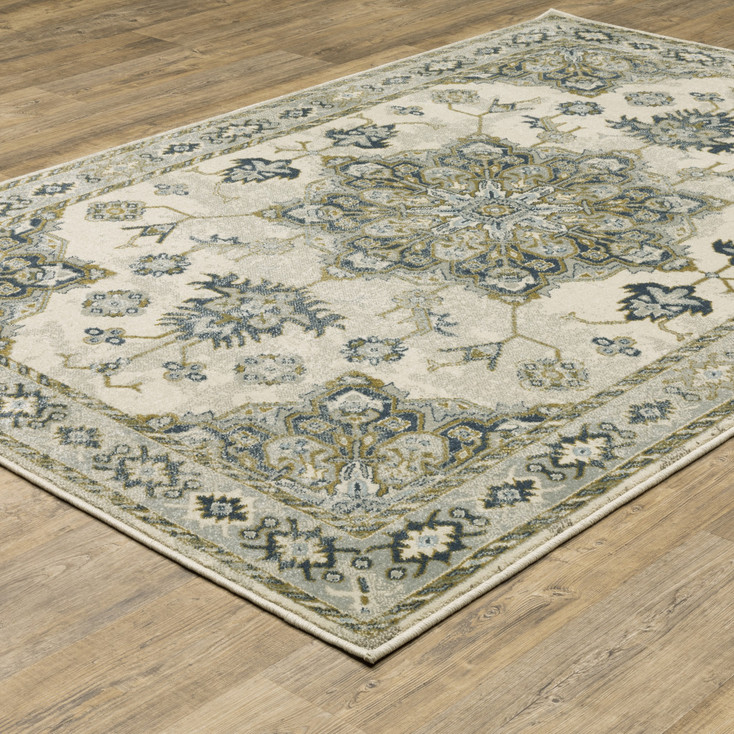 5' x 7' Ivory Blue Teal Grey and Olive Green Oriental Power Loom Stain Resistant Area Rug