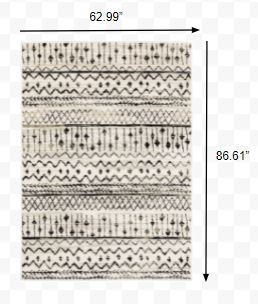 5' x 7' Ivory and Black Eclectic Patterns Indoor Area Rug