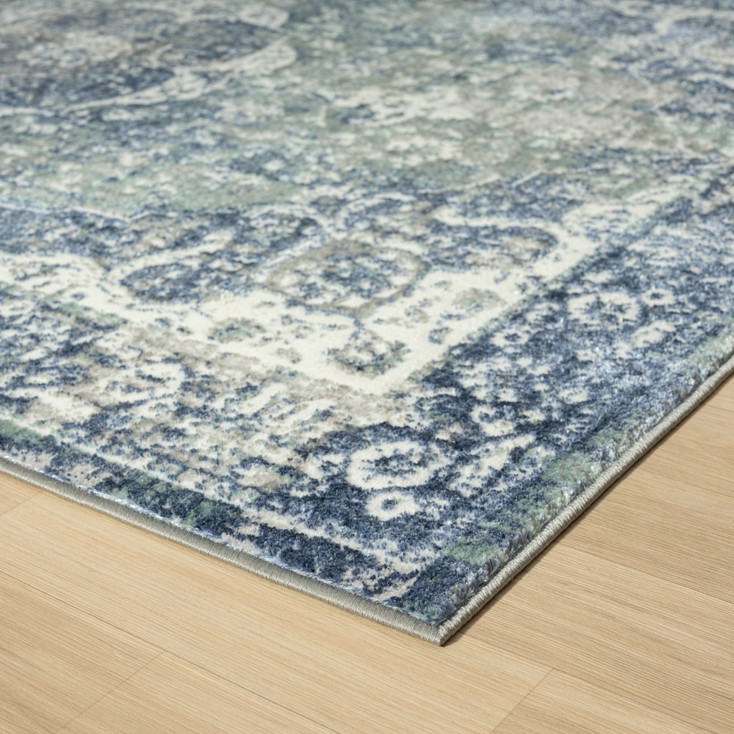 5' x 7' Blue Floral Stain Resistant Area Rug