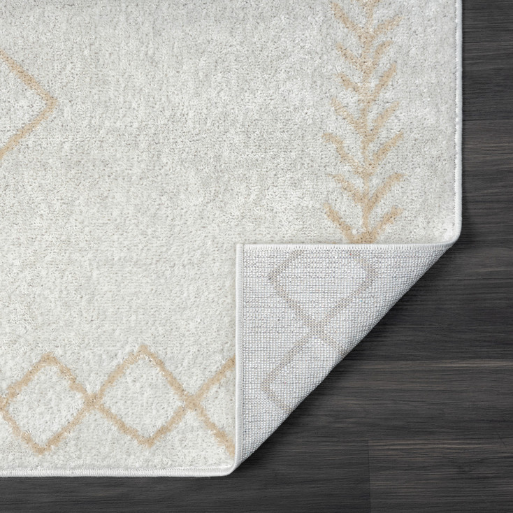 5' x 7' Cream Diamond Polypropylene Area Rug