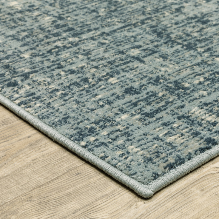 5' x 7' Dark Blue Light Blue Grey Ivory and Beige Abstract Power Loom Area Rug