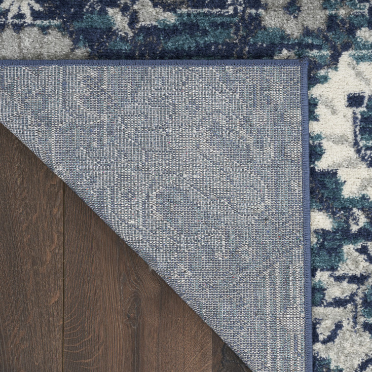 5' x 7' Navy Blue Floral Power Loom Distressed Area Rug