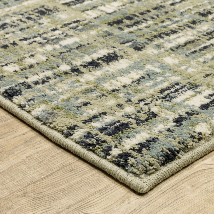 5' x 7' Green Blue Ivory Beige & Light Blue Abstract Power Loom Stain Resistant Area Rug