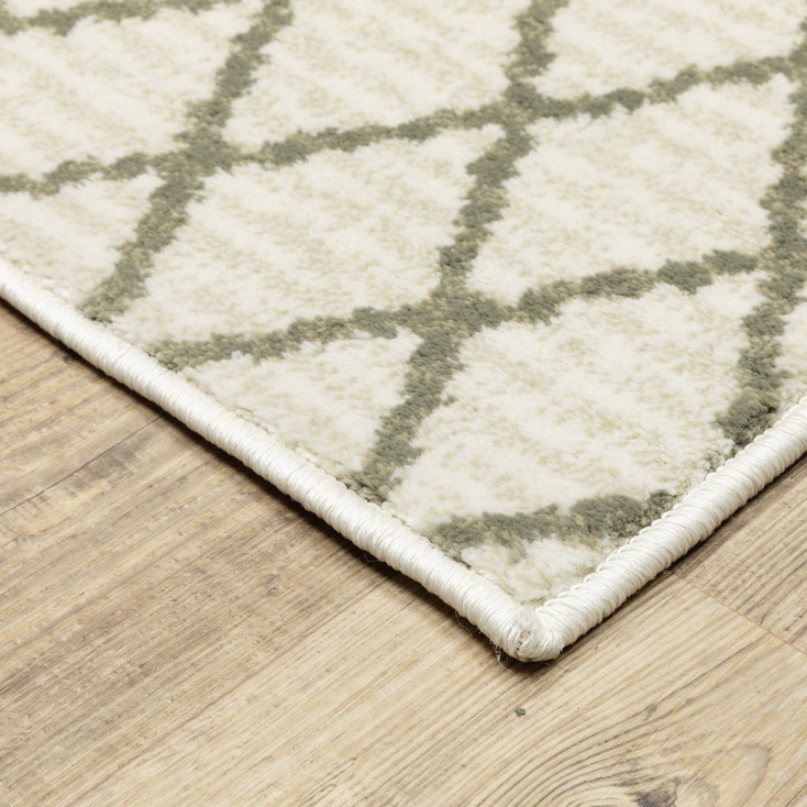 5' x 7' Ivory and Grey Geometric Power Loom Stain Resistant Area Rug