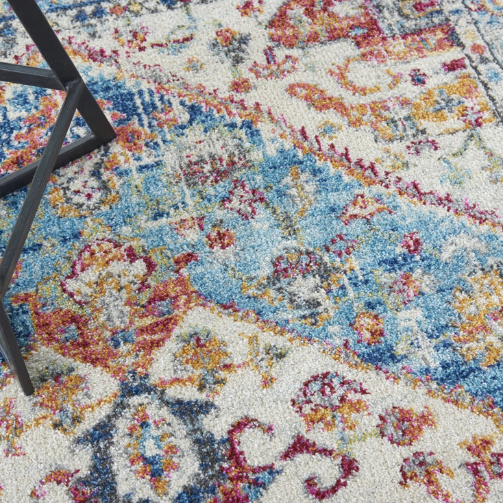 5' x 7' Blue and Ivory Power Loom Polypropylene Area Rug