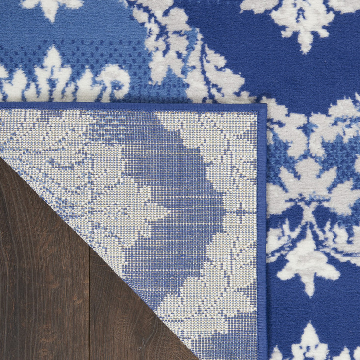 5' x 7' Blue Floral Dhurrie Polypropylene Area Rug