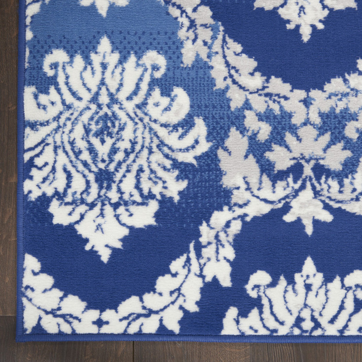 5' x 7' Blue Floral Dhurrie Polypropylene Area Rug