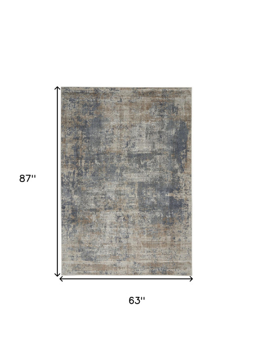 5' x 7' Blue and Beige Abstract Power Loom Distressed Non Skid Area Rug