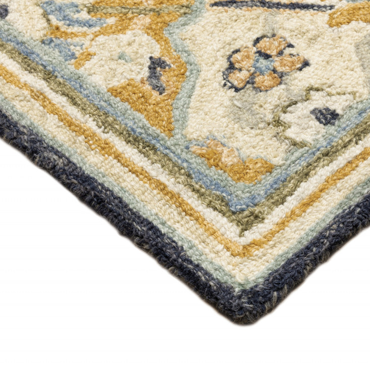 5' x 8' Blue Green Gold Navy and Ivory Geometric Tufted Handmade Stain Resistant Area Rug