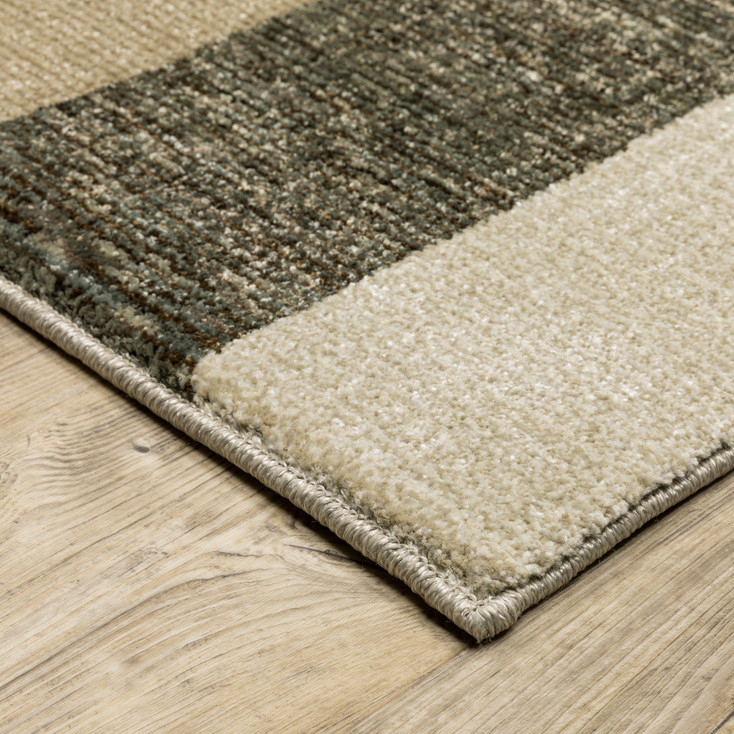 5' x 8' Brown and Ivory Geometric Power Loom Area Rug