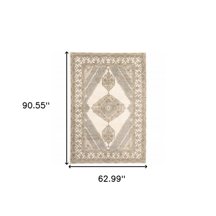 5' x 8' Beige and Ivory Oriental Power Loom Stain Resistant Area Rug