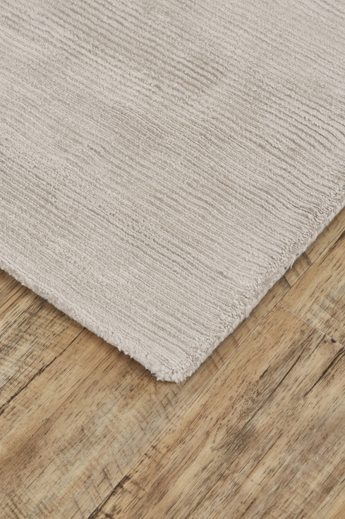 5' x 8' Ivory and Taupe Hand Woven Distressed Area Rug