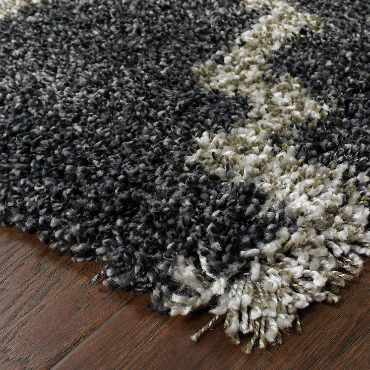 5' x 8' Charcoal and Grey Geometric Shag Power Loom Stain Resistant Area Rug