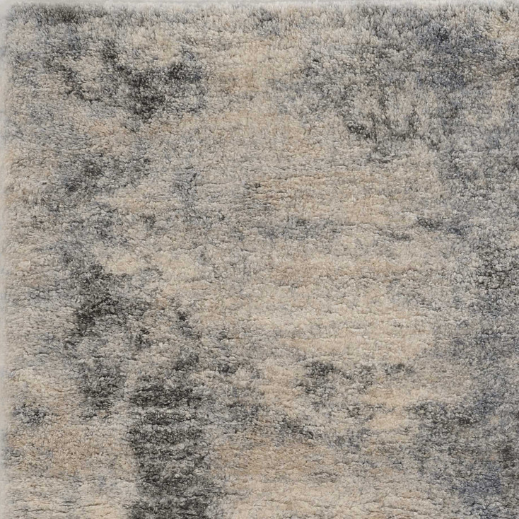 5' x 8' Ivory Blue Machine Woven Abstract Indoor Area Rug