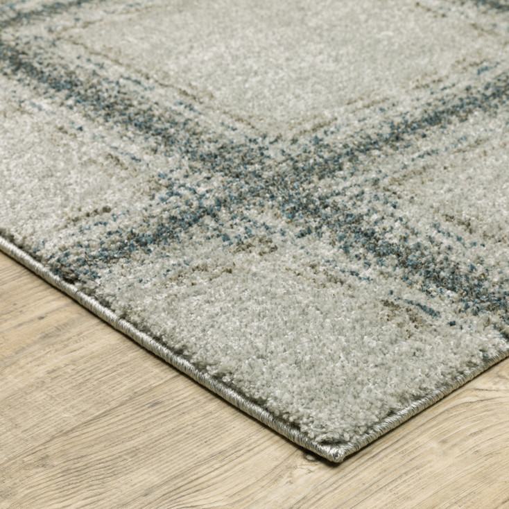 5' x 8' Grey Teal and Beige Geometric Power Loom Stain Resistant Area Rug