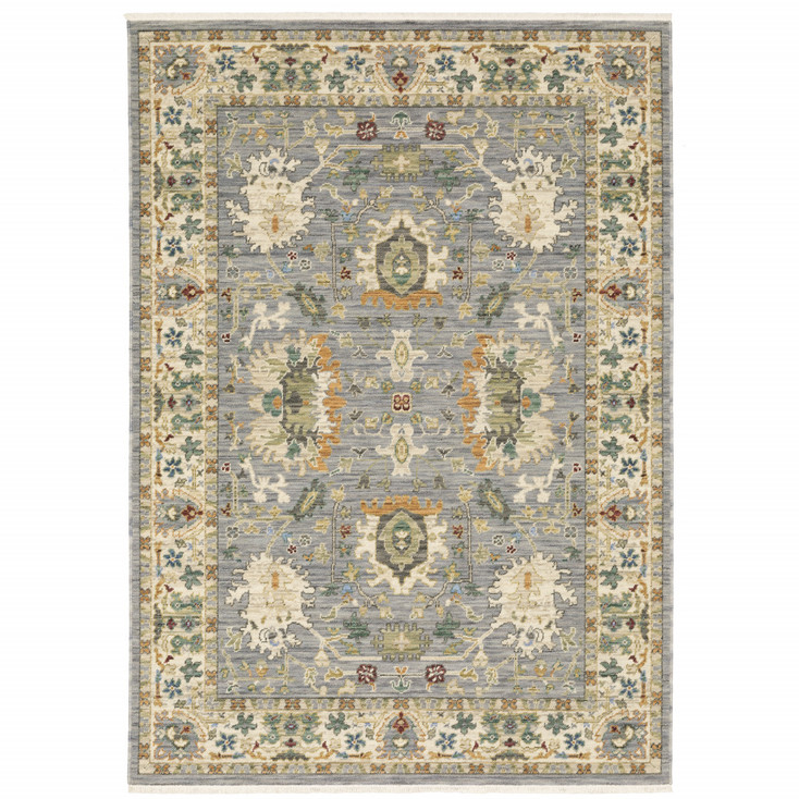 5' x 8' Blue and Ivory Oriental Power Loom Stain Resistant Area Rug with Fringe