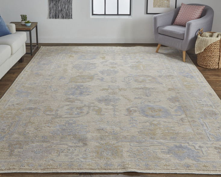 5' x 8' Tan Orange and Blue Floral Hand Knotted Stain Resistant Area Rug